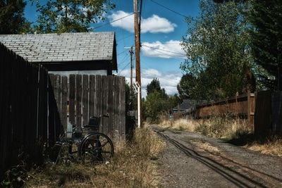 Railway tracks along walls and trees