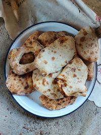 High angle view of bread in plate on table