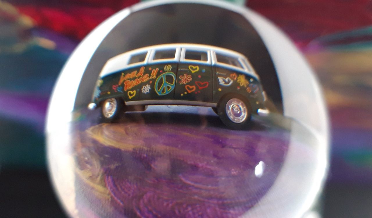 close-up, focus on foreground, no people, metal, indoors, shape, circle, reflection, transparent, bubble, selective focus, geometric shape, still life, glass - material, day, number, communication, detail, car