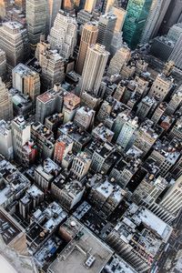 High angle view of modern buildings in city