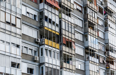 Exterior of old apartment building, balcony, architecture, urban, residential.