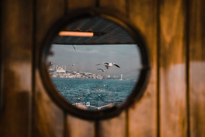 Scenic view of sea seen through window