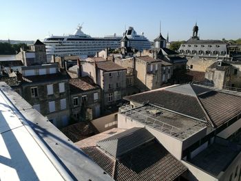 High angle view of buildings in city against sky