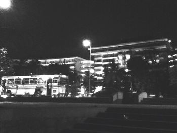 Illuminated buildings against the sky