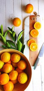 High angle view of orange fruits on table