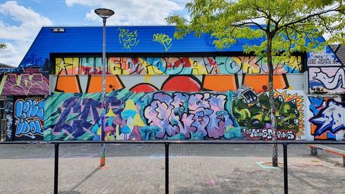 Graffiti on wall by street