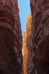 Looking through a partially lit canyon