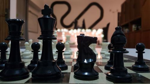 Close-up of chess pieces on board