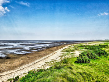 Scenic view of beach against sky