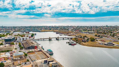 High angle view of port adelaide river amidst buildings in city