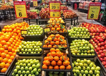 Various fruits for sale at market stall