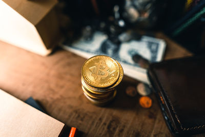 High angle view of coins on table