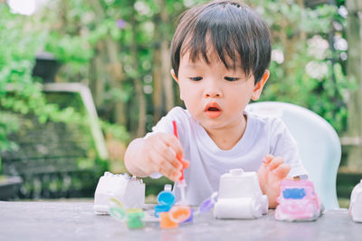 Portrait of cute boy holding ice cream