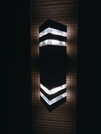 Low angle view of illuminated wall in building