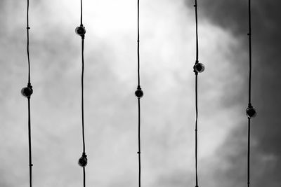 Low angle view of communications tower against sky