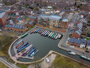 High angle view of harbor by river in city