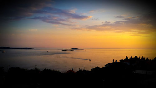 Scenic view of sea at sunset