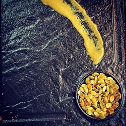 High angle view of yellow fruits on table