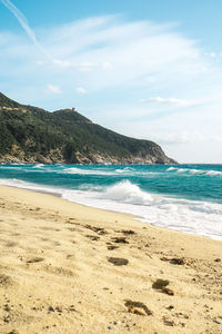 Scenic view of beach against sky