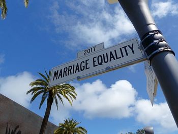 Low angle view of street sign saying "marriage equality"