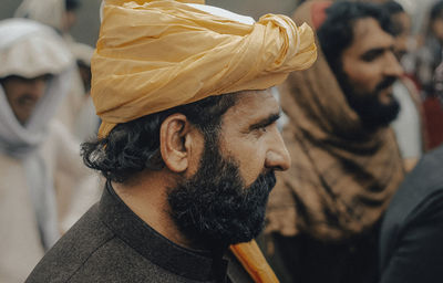 Portrait of man looking at camera