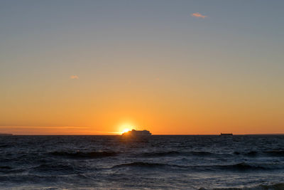 Scenic view of sea against sky during sunset