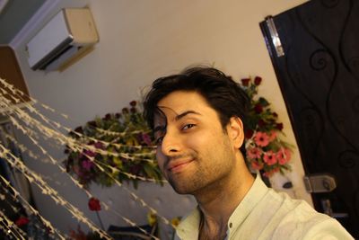 Portrait of young man looking away
