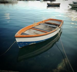 Boat moored in lake