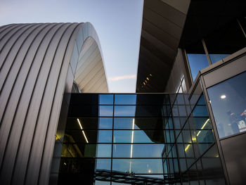 Low angle view of modern building against sky