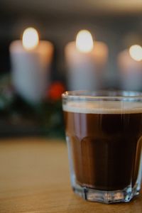 Close-up of coffee in glass on table