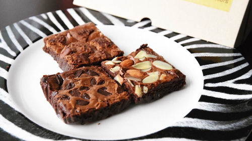 High angle view of chocolate cake in plate on table