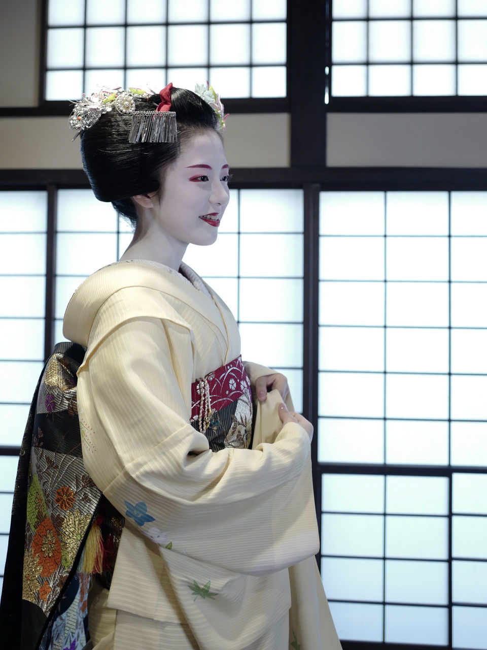 kimono, female, culture, women, costume, adult, traditional clothing, one person, robe, indoors, clothing, window, person, young adult, fashion, elegance, architecture, lifestyles, tradition, history, nature, looking, the past, ceremony, side view, portrait, hair bun, bun