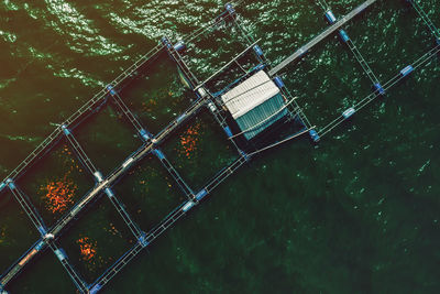 Aerial view of structures in lake