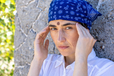 Young woman spiritually connecting with surrounding