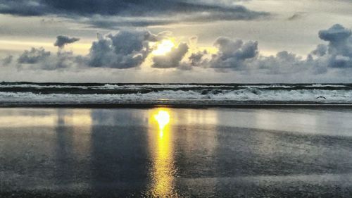 Scenic view of sea at sunset