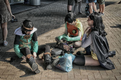 Men sitting outdoors