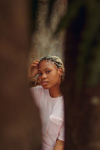 Portrait of young woman outdoors