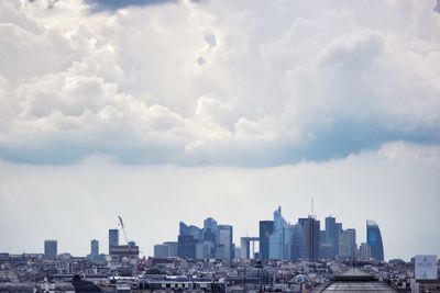 Modern cityscape against sky