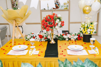 Flower vase on table at home