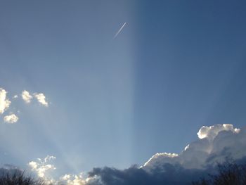 Low angle view of vapor trail in sky