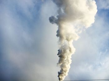 Smoke stack against the sky