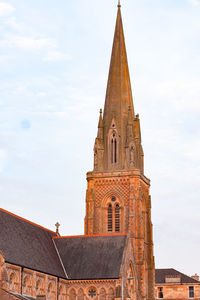 Orange brick church in glasgow, scotland.