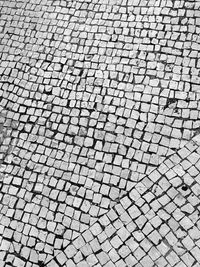 Spot the cigarette - cobblestones in porto