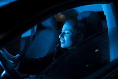 Portrait of man in car