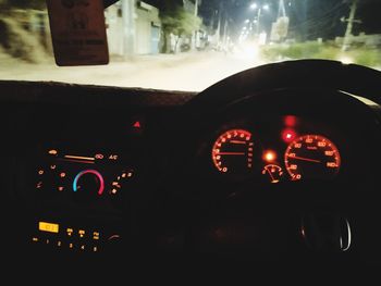 View of illuminated car at night