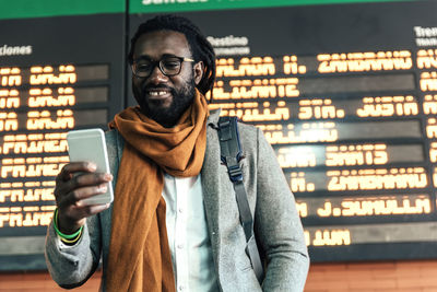 Young man using mobile phone