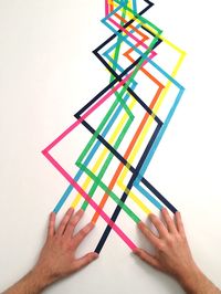 Cropped image of hand holding over white background