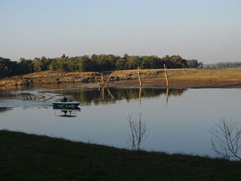 Scenic view of lake against clear sky