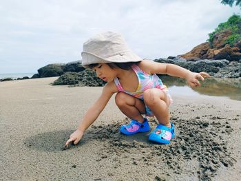 Full length of woman on beach