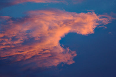 Low angle view of cloudy sky at sunset